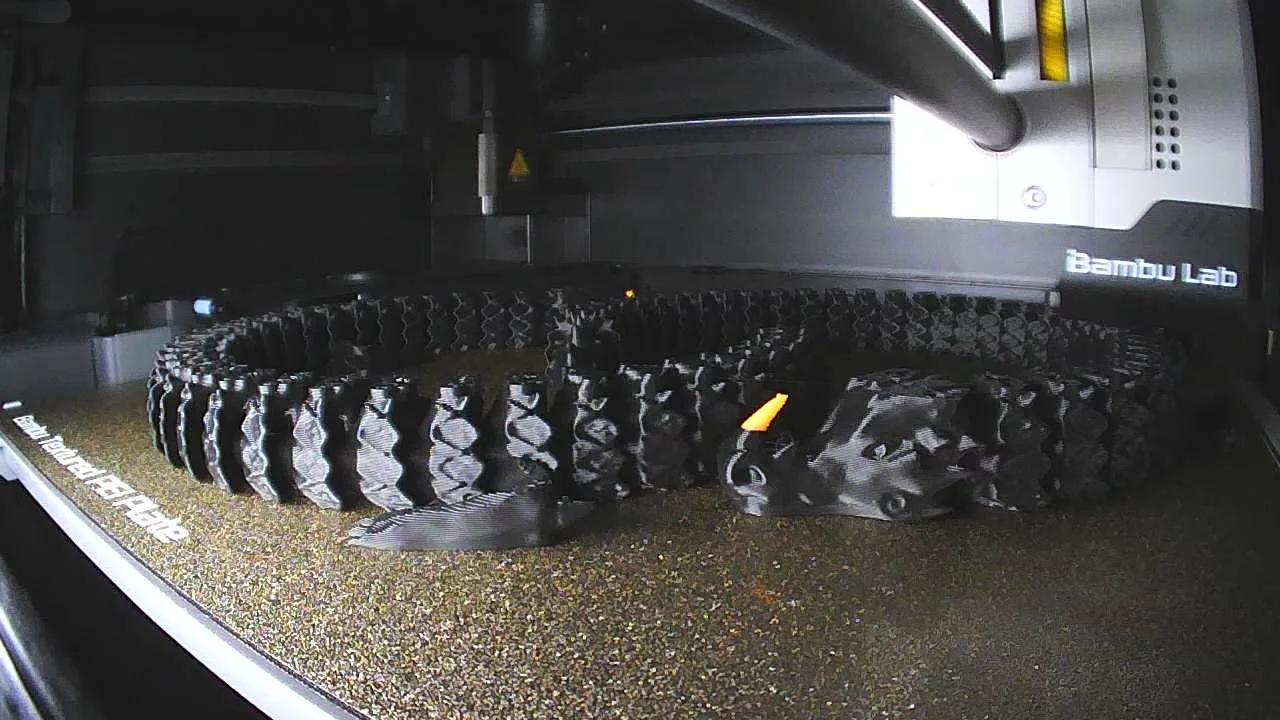 Articulated model taking shape inside a Bambu Lab P1S printer